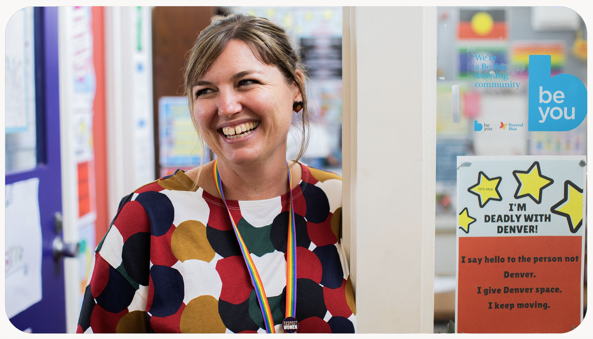 An educator with a big smile