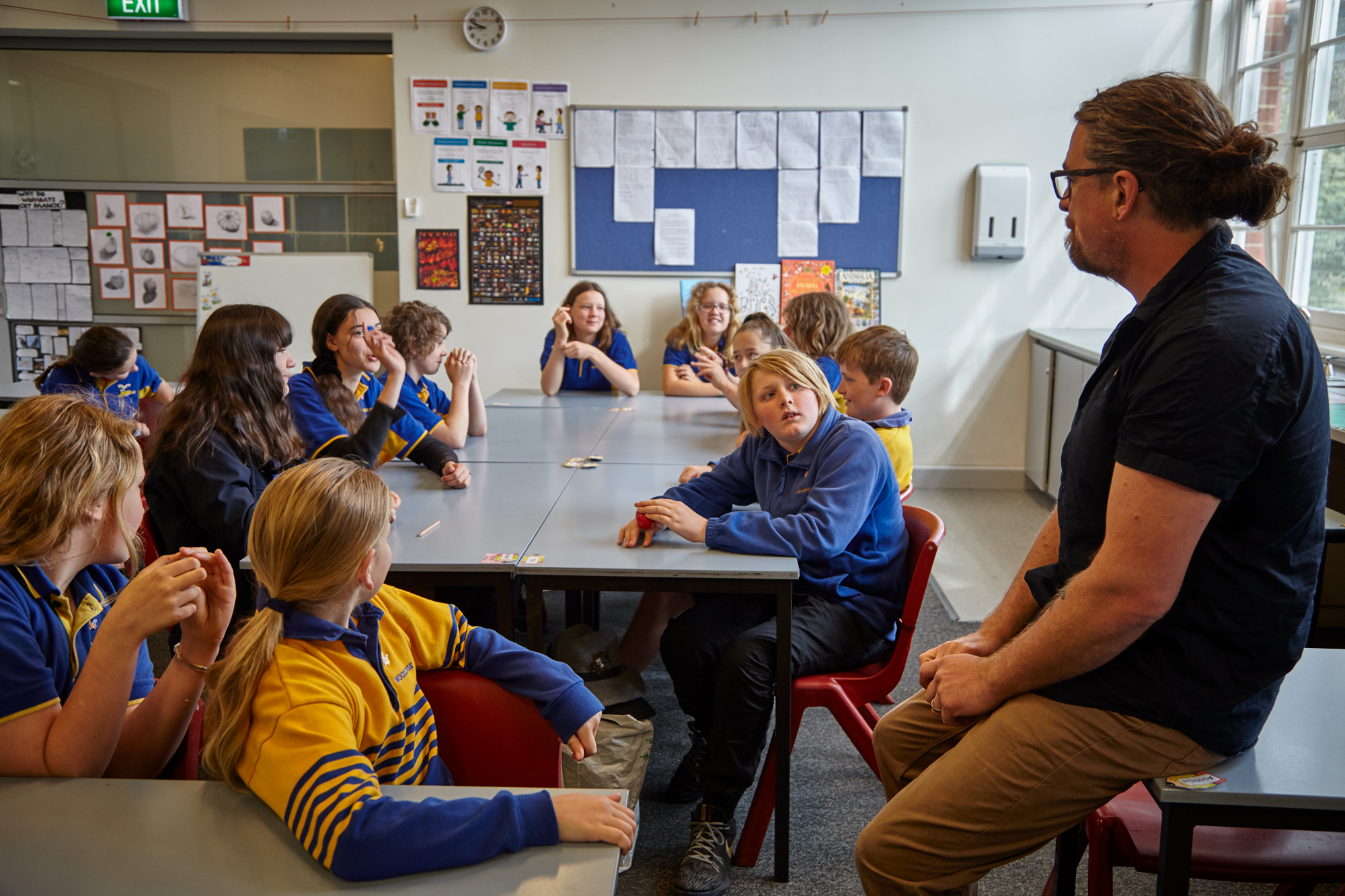 An educator in a classroom with children  