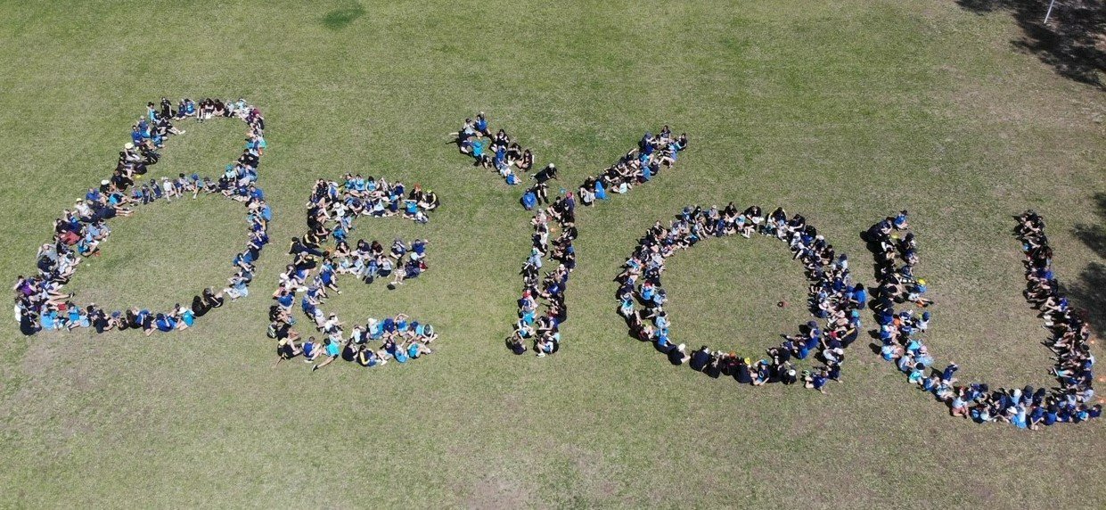 Students make a Be You sign
